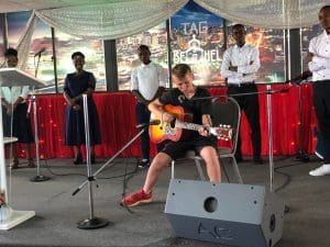 Jack leading worship at the Dar Es Salaam International Church 